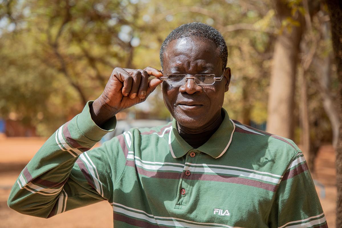 Burkinabe holds his OneDollarGlasses
